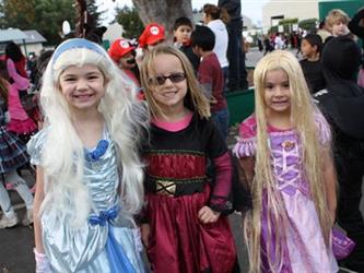 Students posing in princess costumes