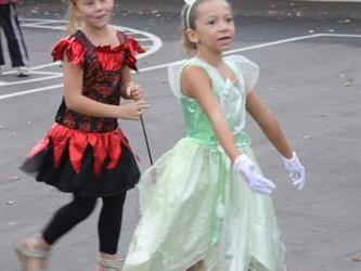 Students playing wearing costumes