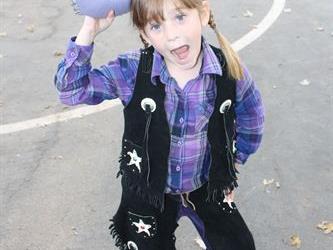 A student in a cow girl costume
